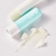 Dr. Massing SoftLips Lippenpflege mit Hyaluron Lippenpflege mit Sheabutter Detailansicht Textur auf weißen Hintergrund petrolfarbige Verpackung